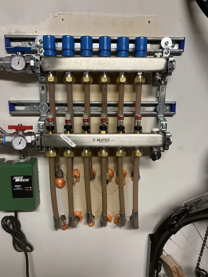 Plumber performing Gas Leak Detection at a residential property in Ludlow